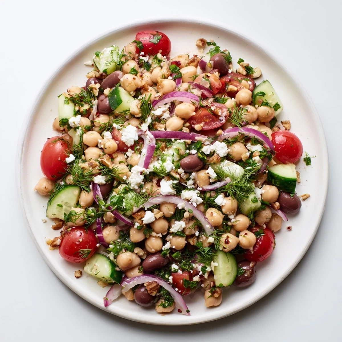 Vibrant photo of a Dense Bean Salad with Sleepy Girl Mocktail Dressing, featuring colorful beans and fresh herbs.
