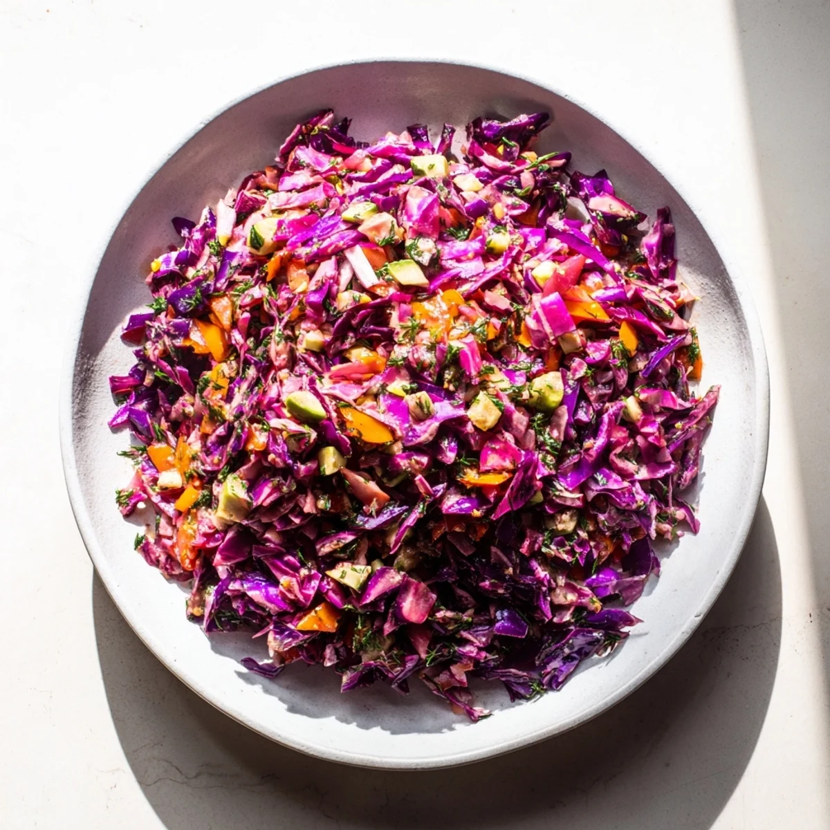 Crisp Green Goddess Detox Cabbage Salad with colorful veggies tossed in a vibrant, zesty dressing.