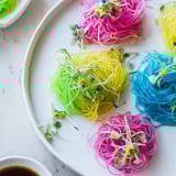 Appealing image of neon noodle clouds, a gluten-free and vegan dish with colorful agar-agar noodles.