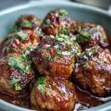 2. Easy slow cooker meatballs simmered with garlic, herbs, and crushed tomatoes, perfect for stress-free entertaining or family dinners.  