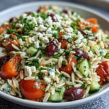 Bright Summer Orzo Salad with Feta Lemon, vibrant colors, a refreshing lemon dressing.