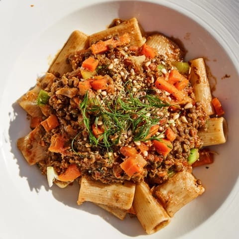 A close-up shot of rich and hearty High-Fiber Lentil Bolognese, ideal for a comforting vegetarian supper.