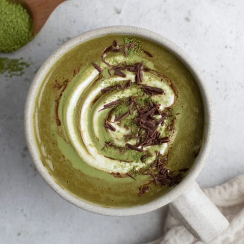 A close-up of a rich, chocolatey Matcha Hot Cocoa Protein Mug, a quick and delicious beverage.