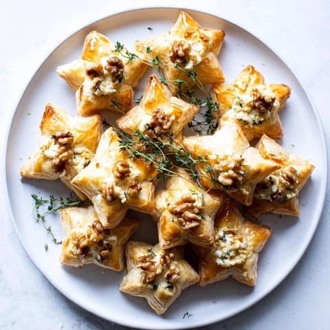 Delectable Starry Night New Years Appetizers arranged on a platter, showcasing smoked salmon and brie flavors.