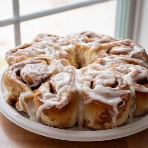 A festive holiday breakfast: a close-up of a beautifully shaped Giant Snowflake Sweet Roll.