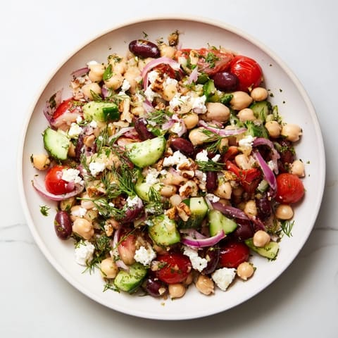 This refreshing Dense Bean Salad with Sleepy Girl Mocktail Dressing showcases a hearty bowl of wholesome ingredients.
