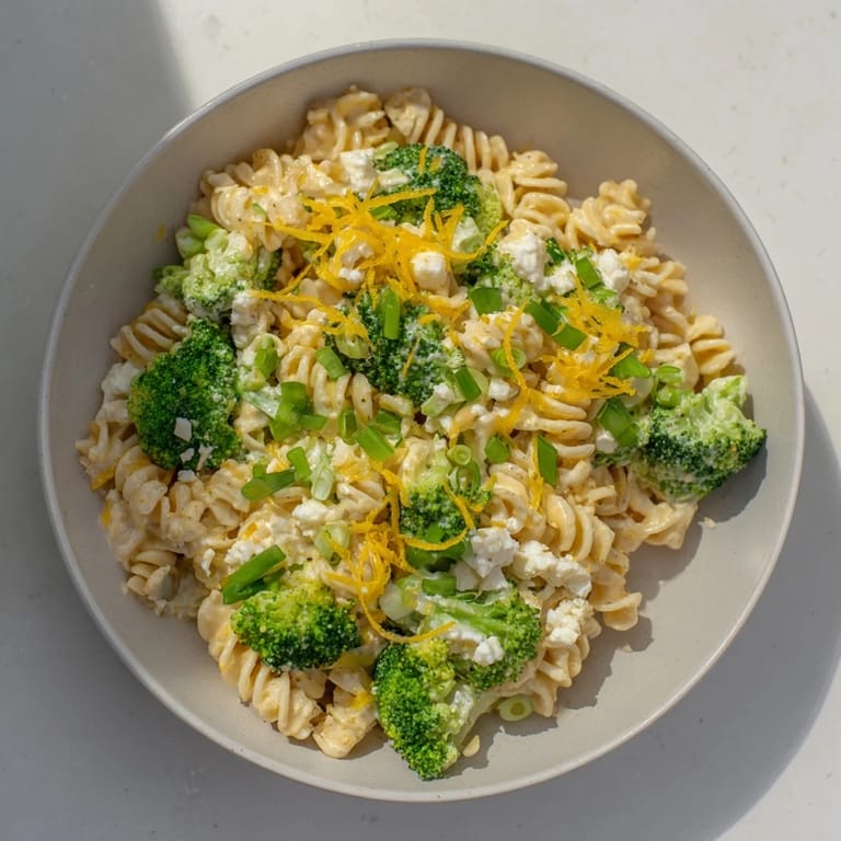 Golden cheddar and vibrant broccoli highlight this easy Green Goddess Broccoli Cheddar One-Pot Pasta dish.
