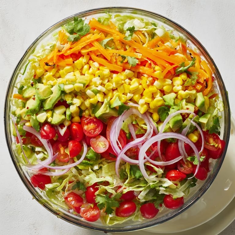 Delicious Southwest Sunset Palette salad: crunchy vegetables, zesty cheese, black beans, all ready to eat immediately.