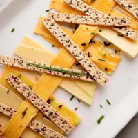 The Garden Gate Lattice appetizer: a beautiful cheese and cracker arrangement for elegant entertaining.