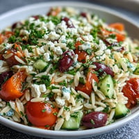 Bright Summer Orzo Salad with Feta Lemon, vibrant colors, a refreshing lemon dressing.